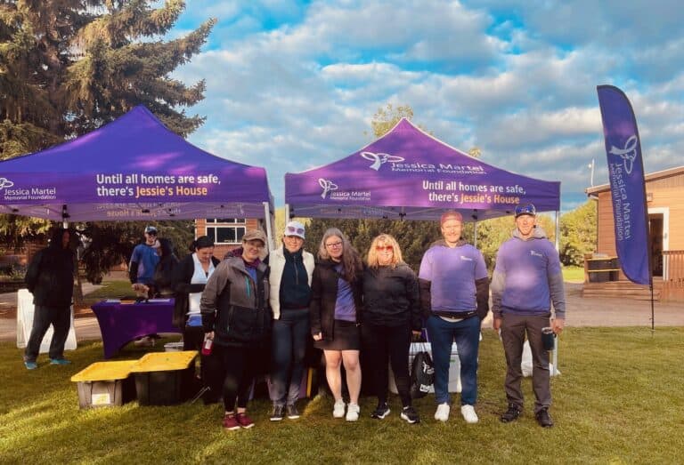Volunteers from Pembina working under the event tent at a Jessica Martel Memorial Foundation event.