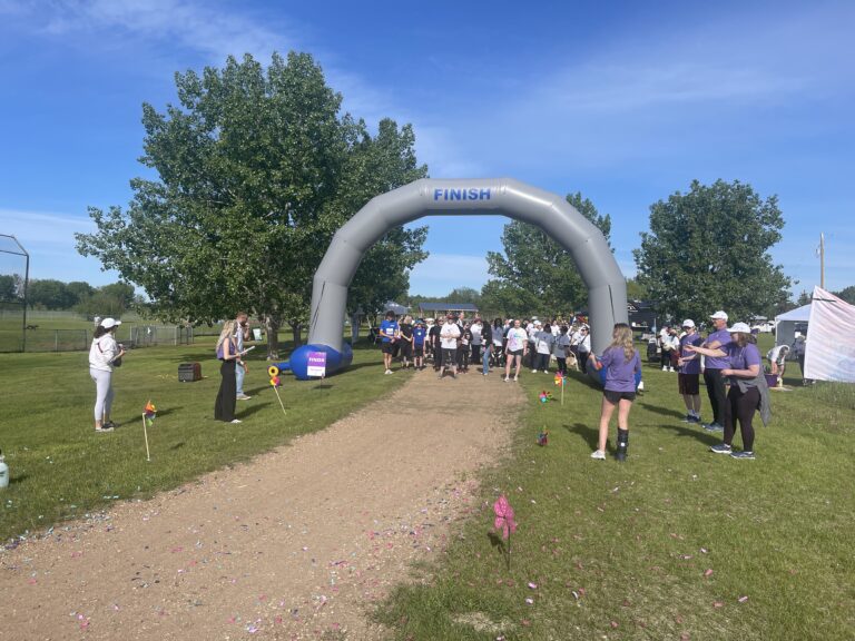 Walkers making their way along the course towards the finish arch at the Break Free Run and Walk.