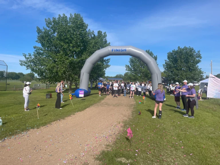 Walkers making their way along the course towards the finish arch at the Break Free Run and Walk.