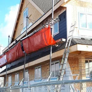 Jessie's House under construction, with scaffolding along the front.