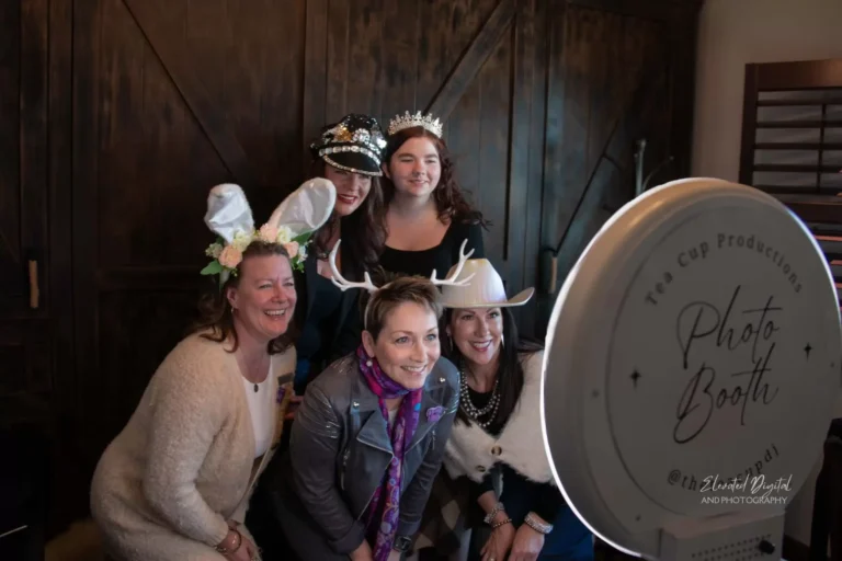 Guests wearing crowns at the photo booth at Jessie's Crowns.