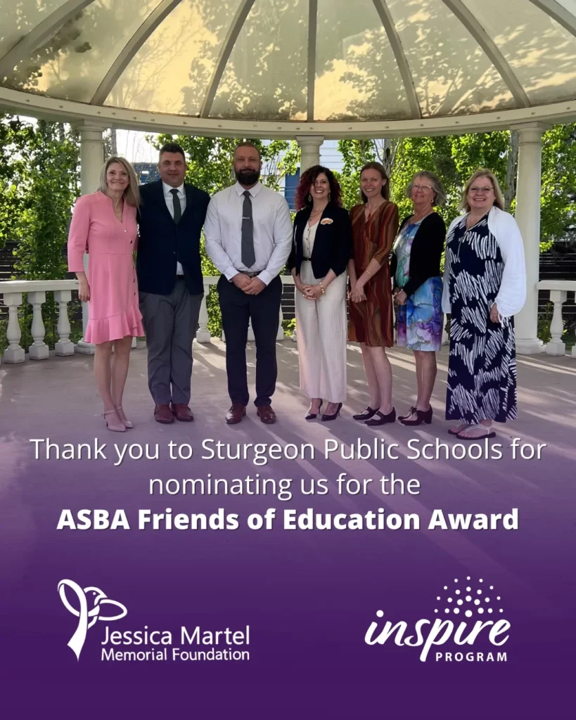 A group standing together in a gazebo, with the words: Thank you to Sturgeon Public Schools for nominating us for the ASBA Friends of Education Award.